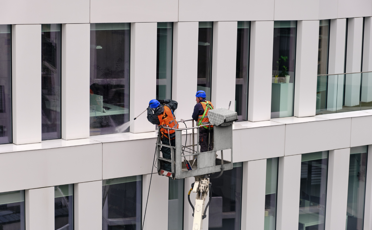 Window cleaners on lift